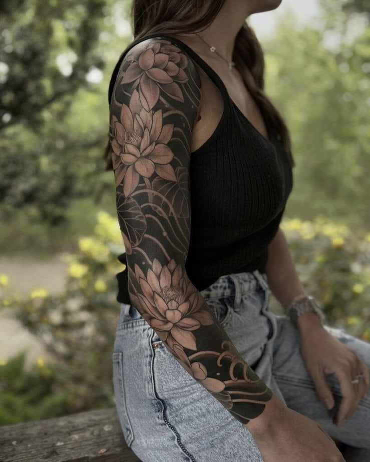 4. A water lily sleeve tattoo 