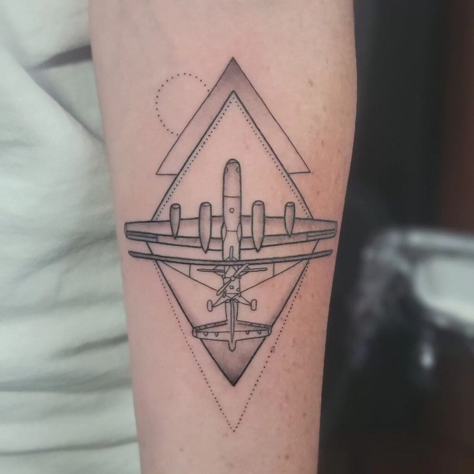 25. Geometrical plane tattoo