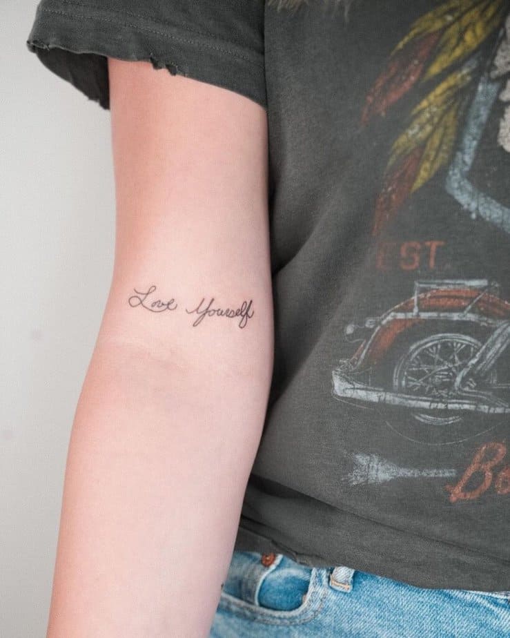 2. A “love yourself” tattoo in your parents’ writing 