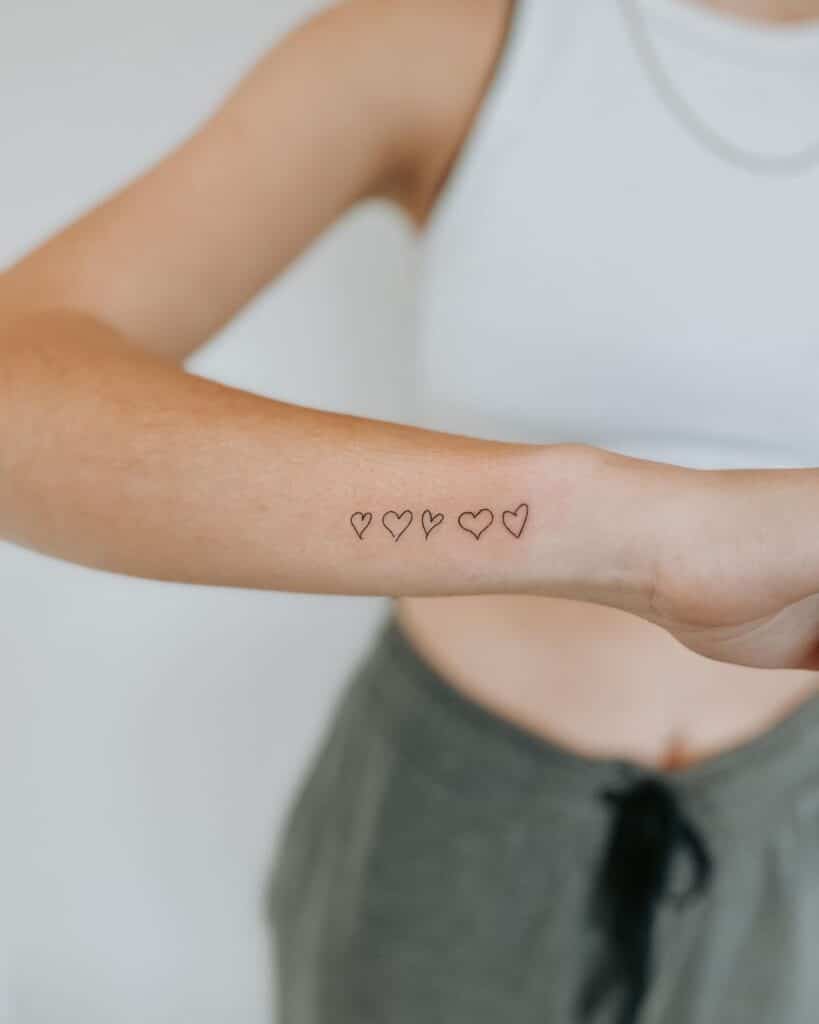25. A tattoo of a sequence of hearts drawn by your parents 