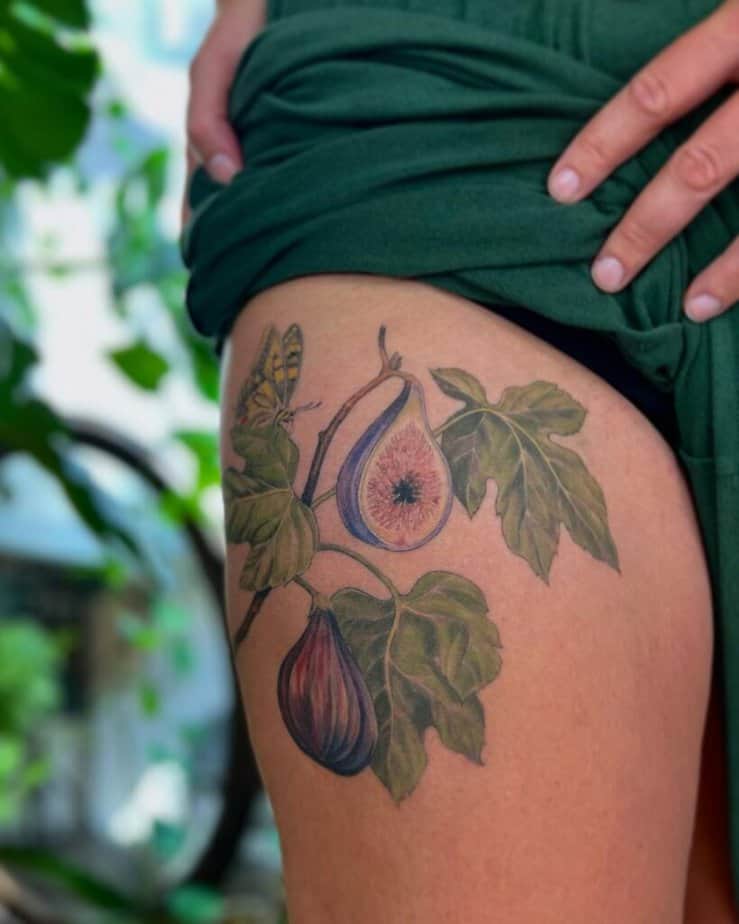 22. A fig tattoo on the thigh