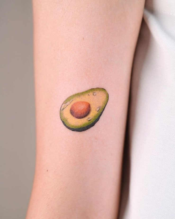 7. A tattoo of avocado on the arm