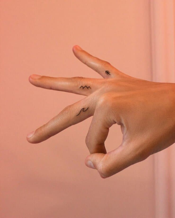 11. A minimalist tattoo on the finger 