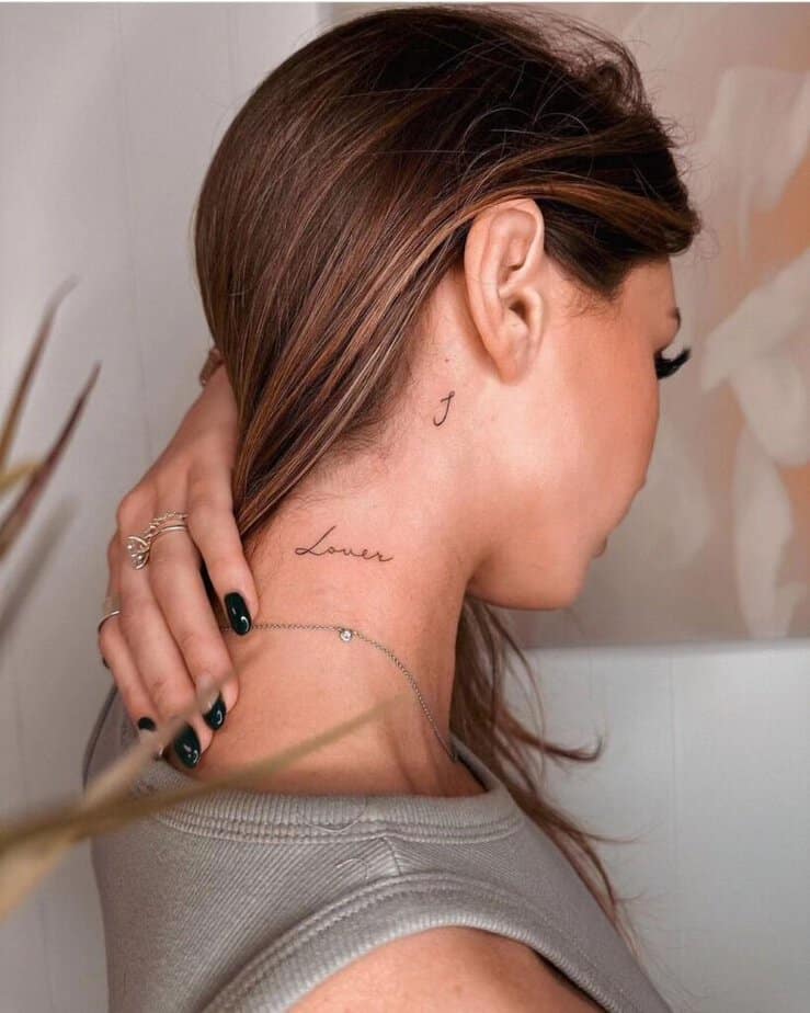 2. A word tattoo on the neck 