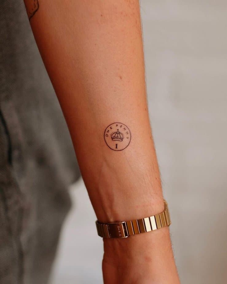 21. A penny tattoo on the wrist