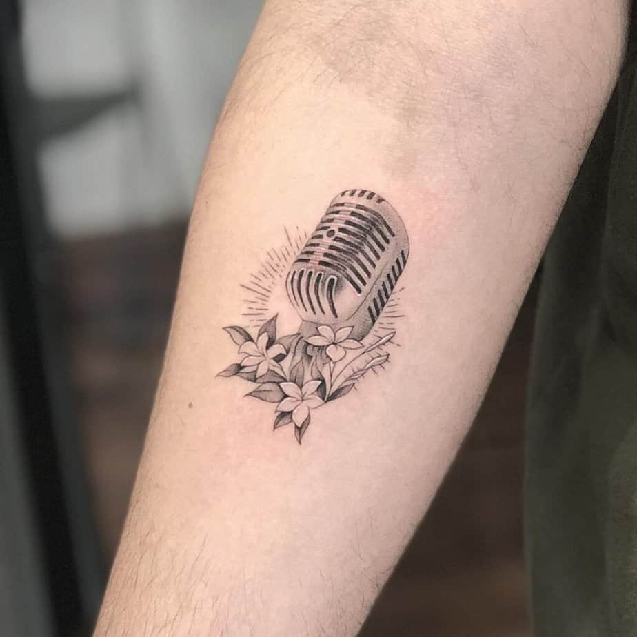 Black and gray microphone tattoos
