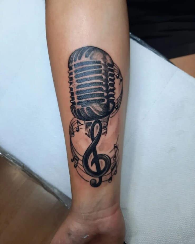 Microphone tattoos with other musical details