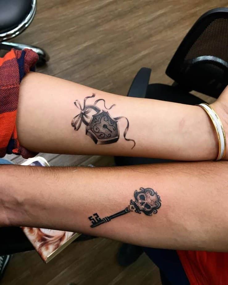 Matching lock and key tattoos