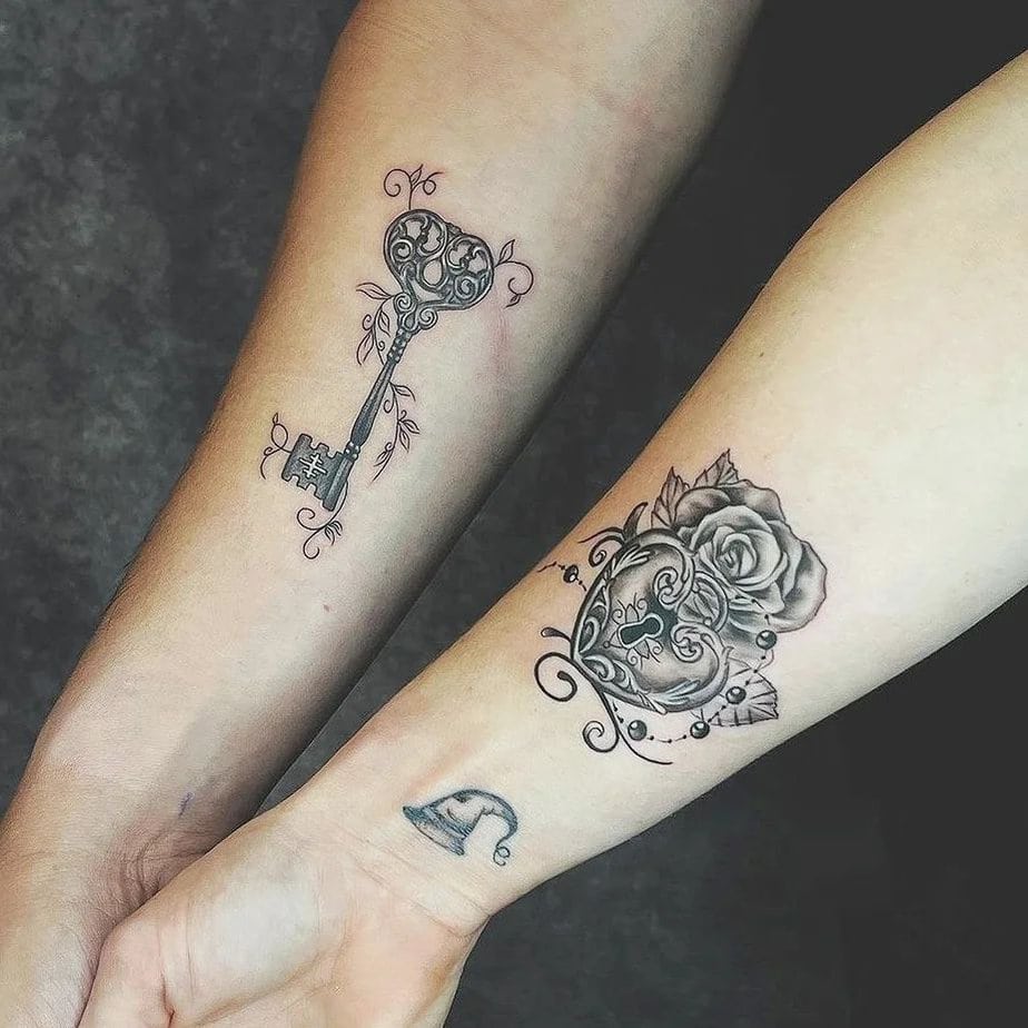 Matching lock and key tattoos