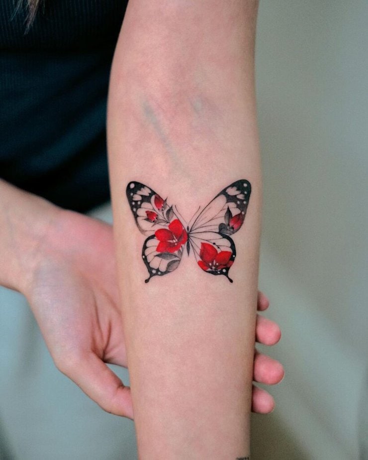 Black and red butterfly tattoo