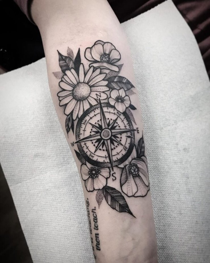 Floral compass tattoo