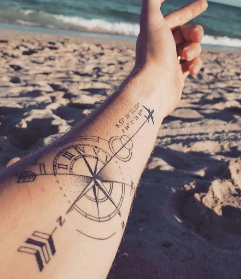 Compass and plane tattoo
