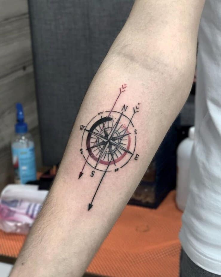 A specific style of compass tattoo