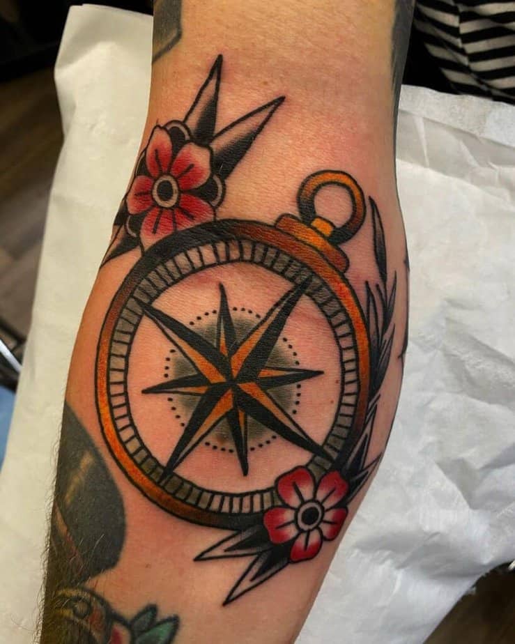 A specific style of compass tattoo
