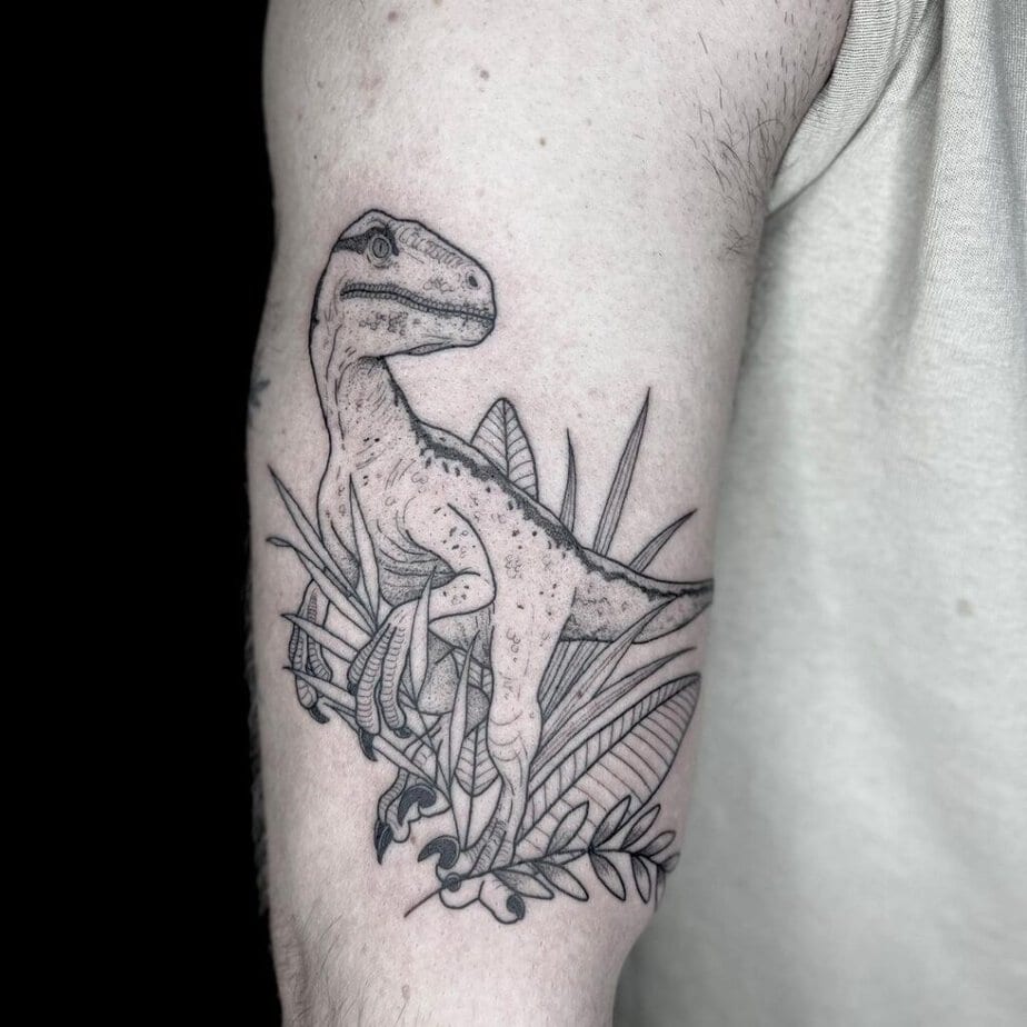 Realistic black and gray dinosaur tattoos