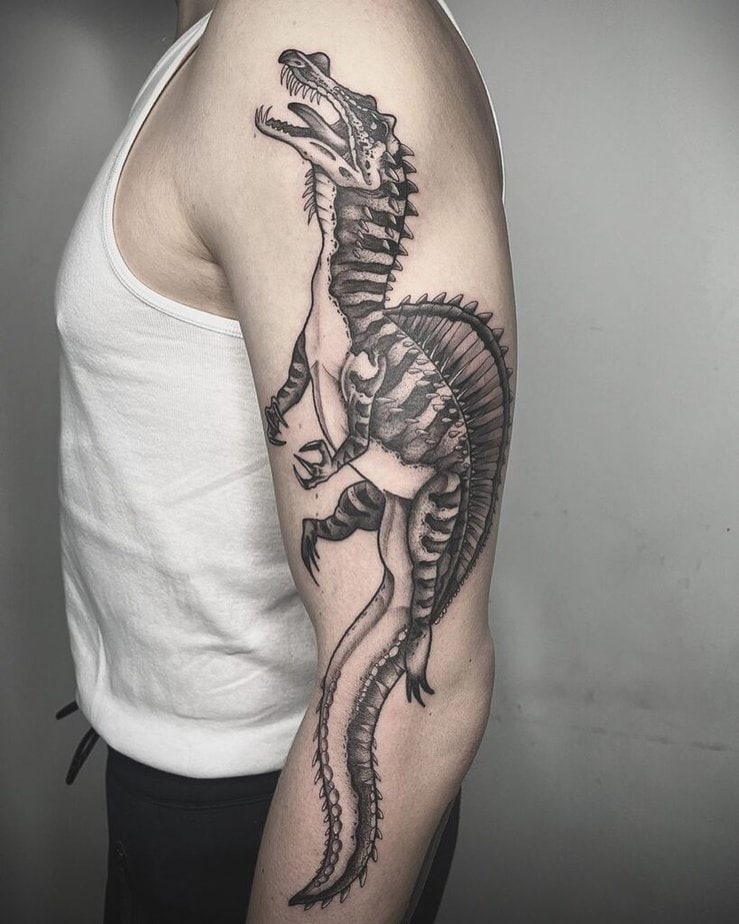 Realistic black and gray dinosaur tattoos