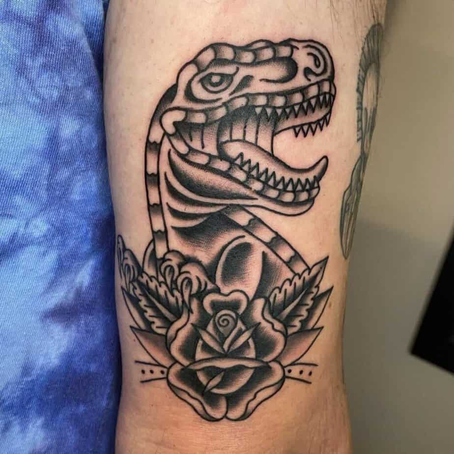 Floral dinosaur tattoos