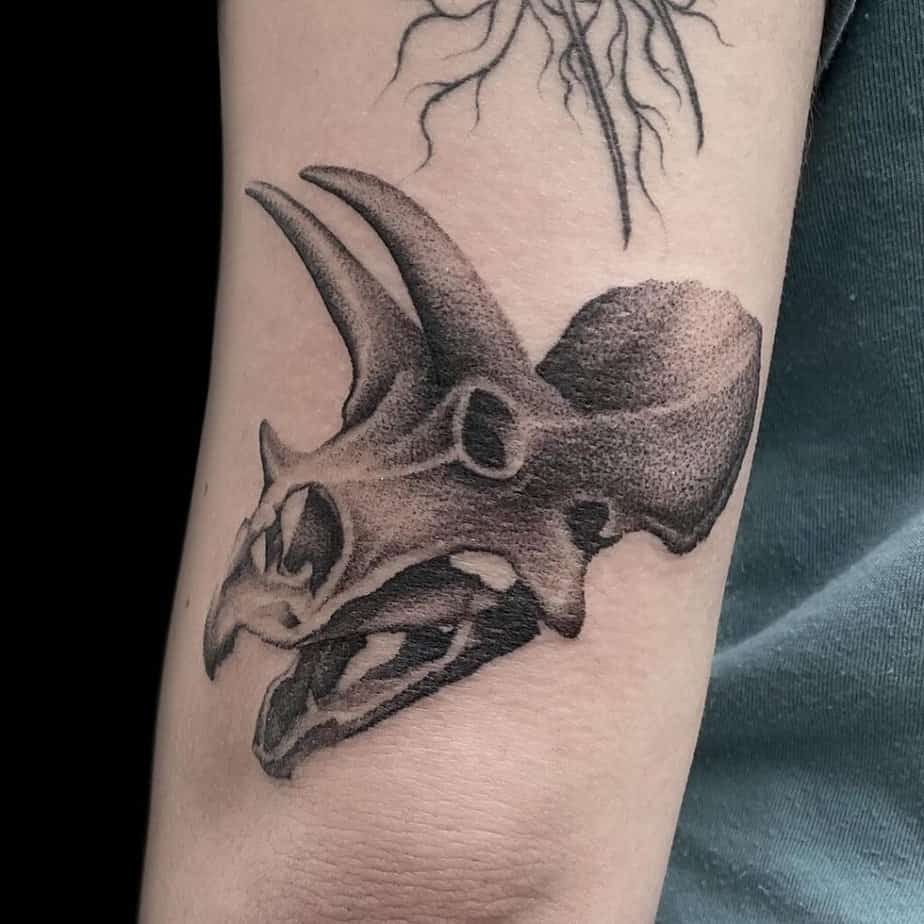 Skull dinosaur tattoos