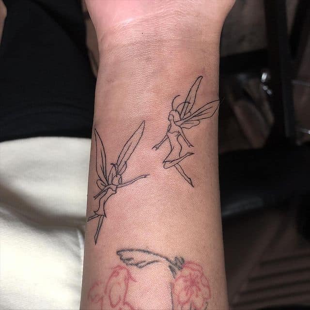 14. Wrist fairy tattoo