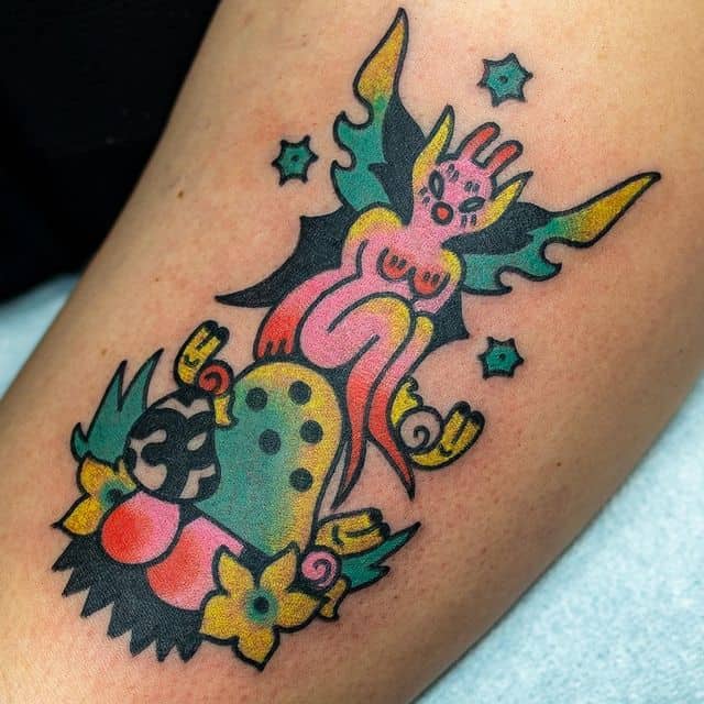 19. Cool alien fairy tattoo