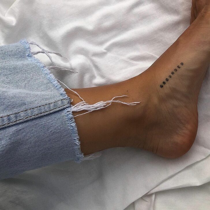 26 One-Word Tattoos That Attest To The Power Of Simplicity