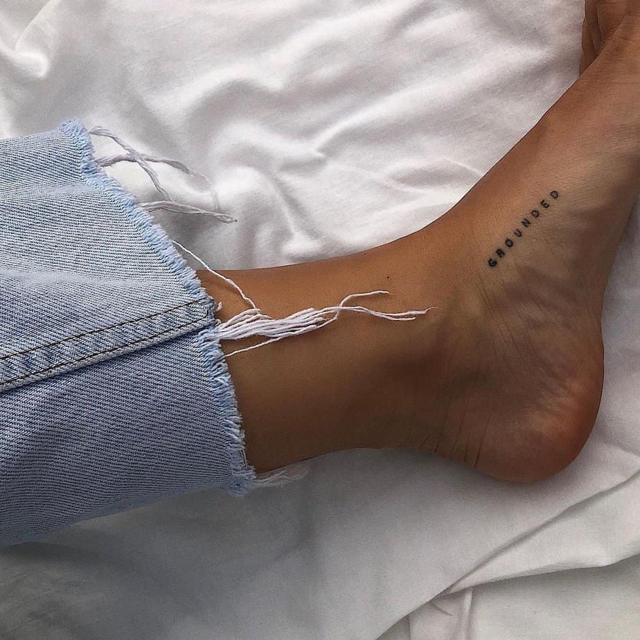 A “grounded” tattoo on the foot