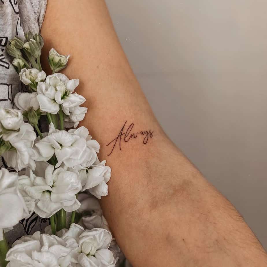 14. A tattoo of “always” on the upper arm
