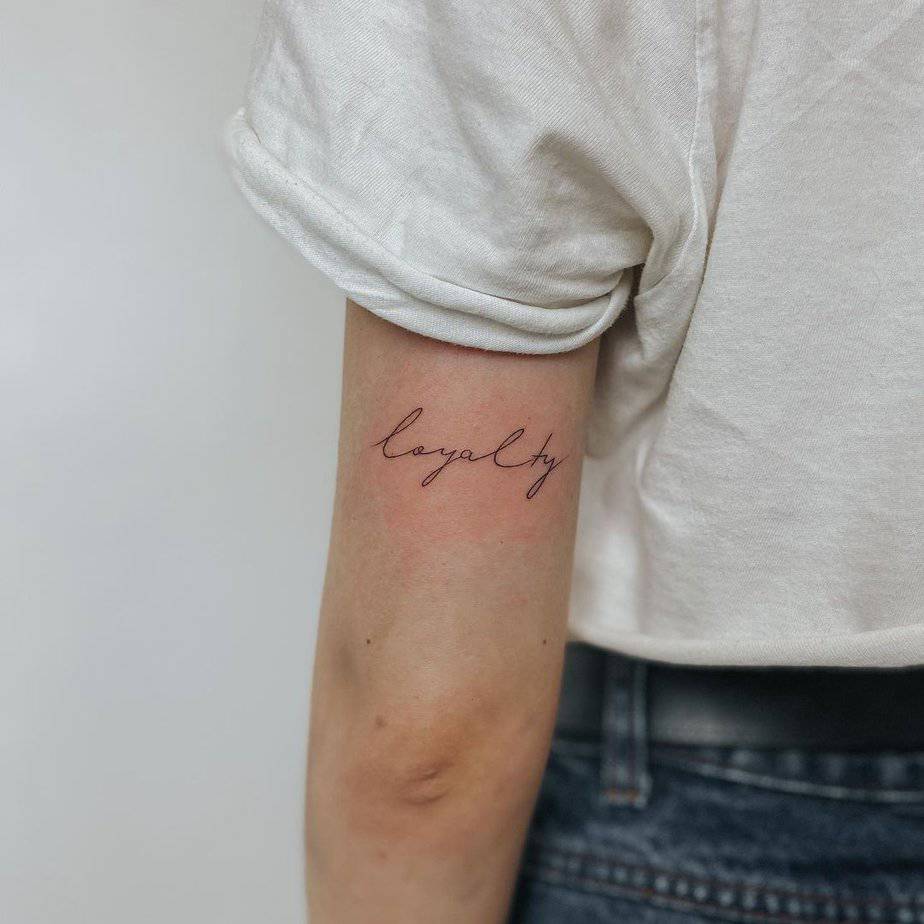 16. A “loyalty” tattoo on the back of the elbow