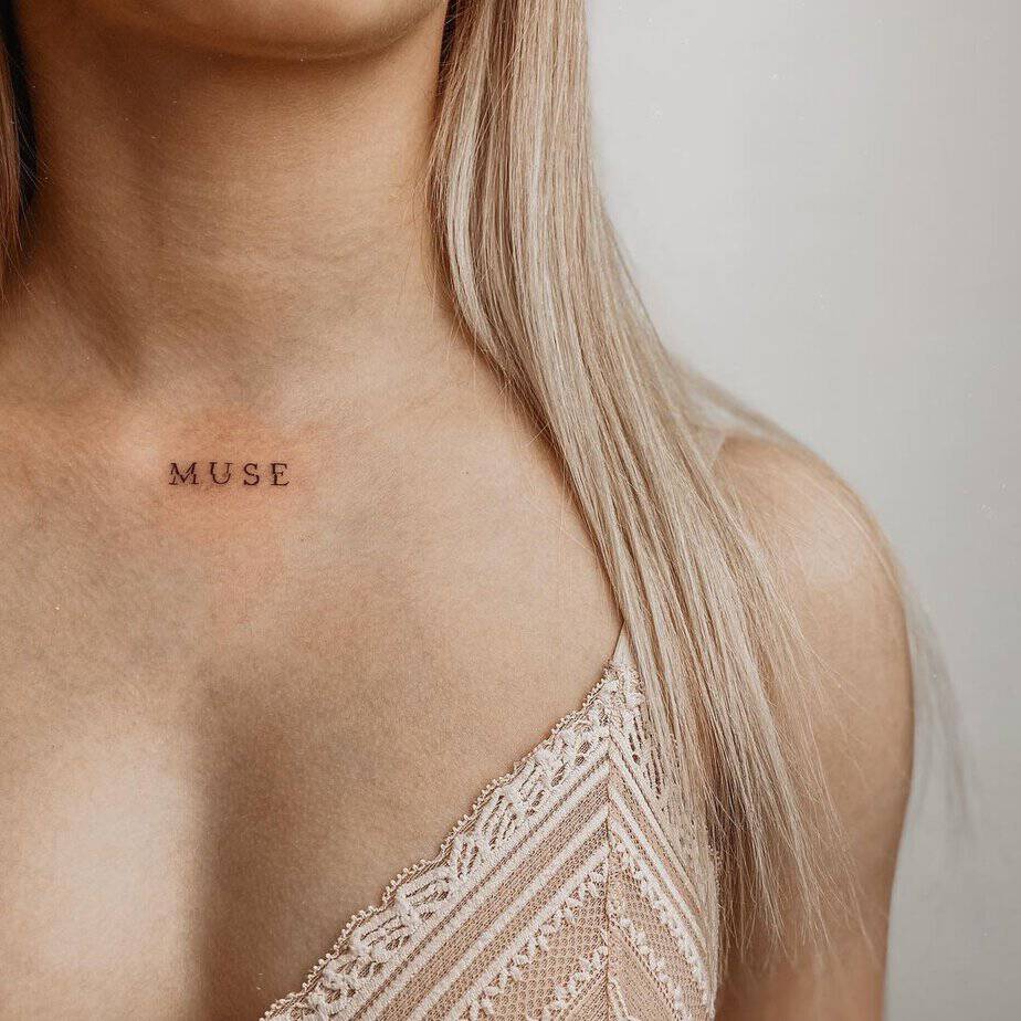 A “muse” tattoo on the chest
