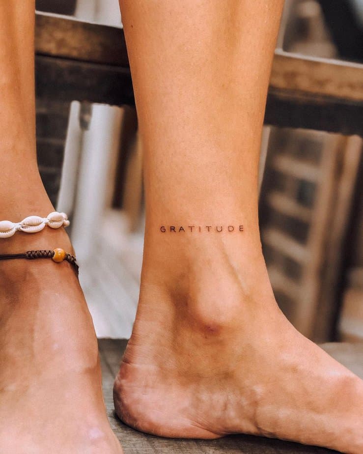 23. A “gratitude” tattoo on the ankle