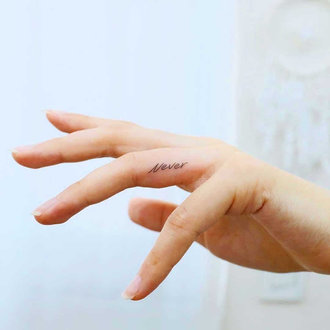 25. A “never” tattoo on the finger