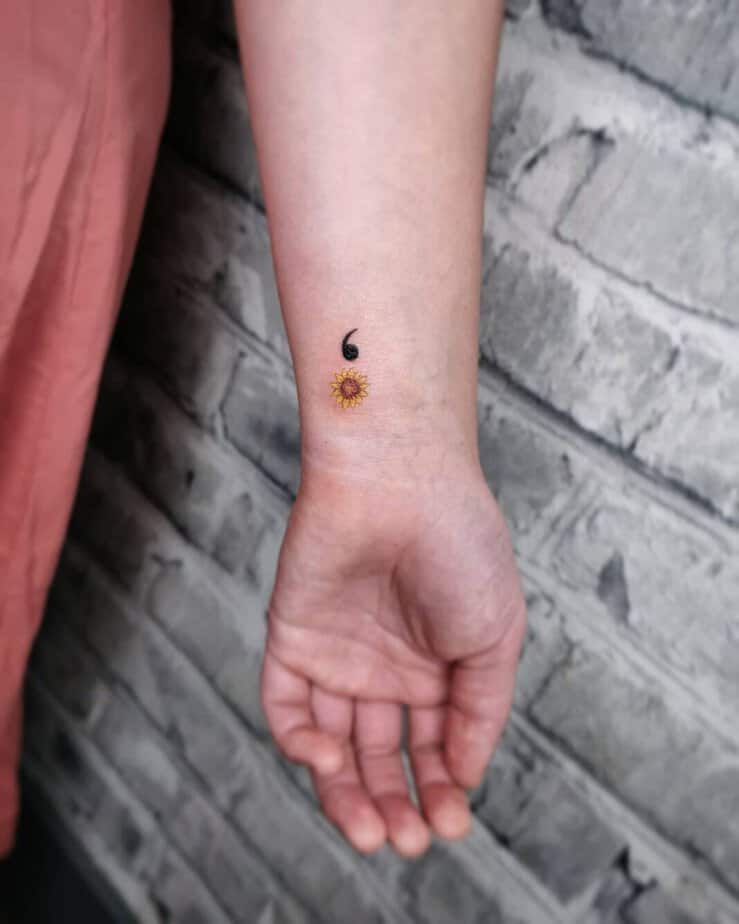 Flower semicolon tattoo