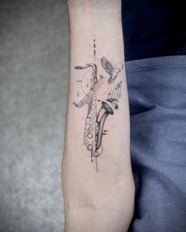 17. A sax tattoo with a bird