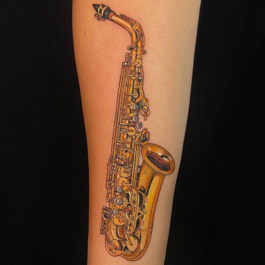 9. A colored sax tattoo 