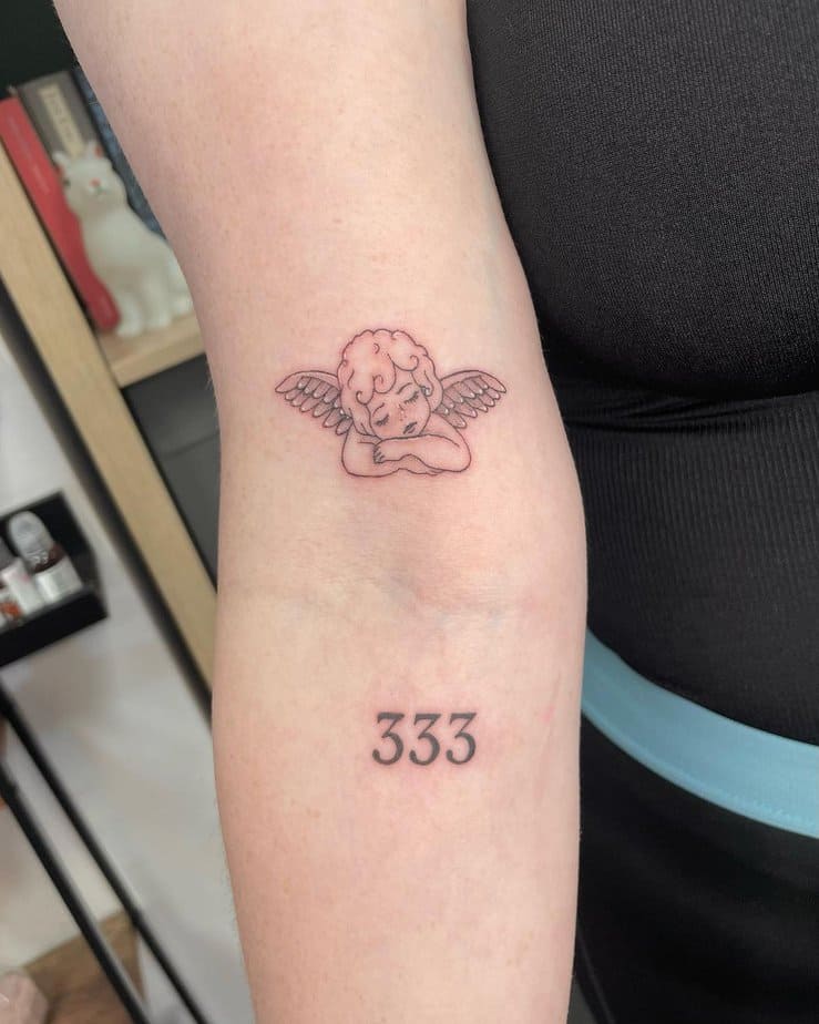 4. Angel number with an angel tattoo