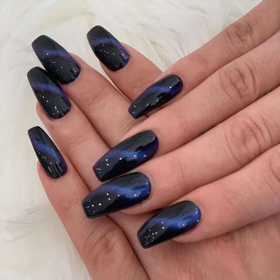 4. Dark blue galaxy nails