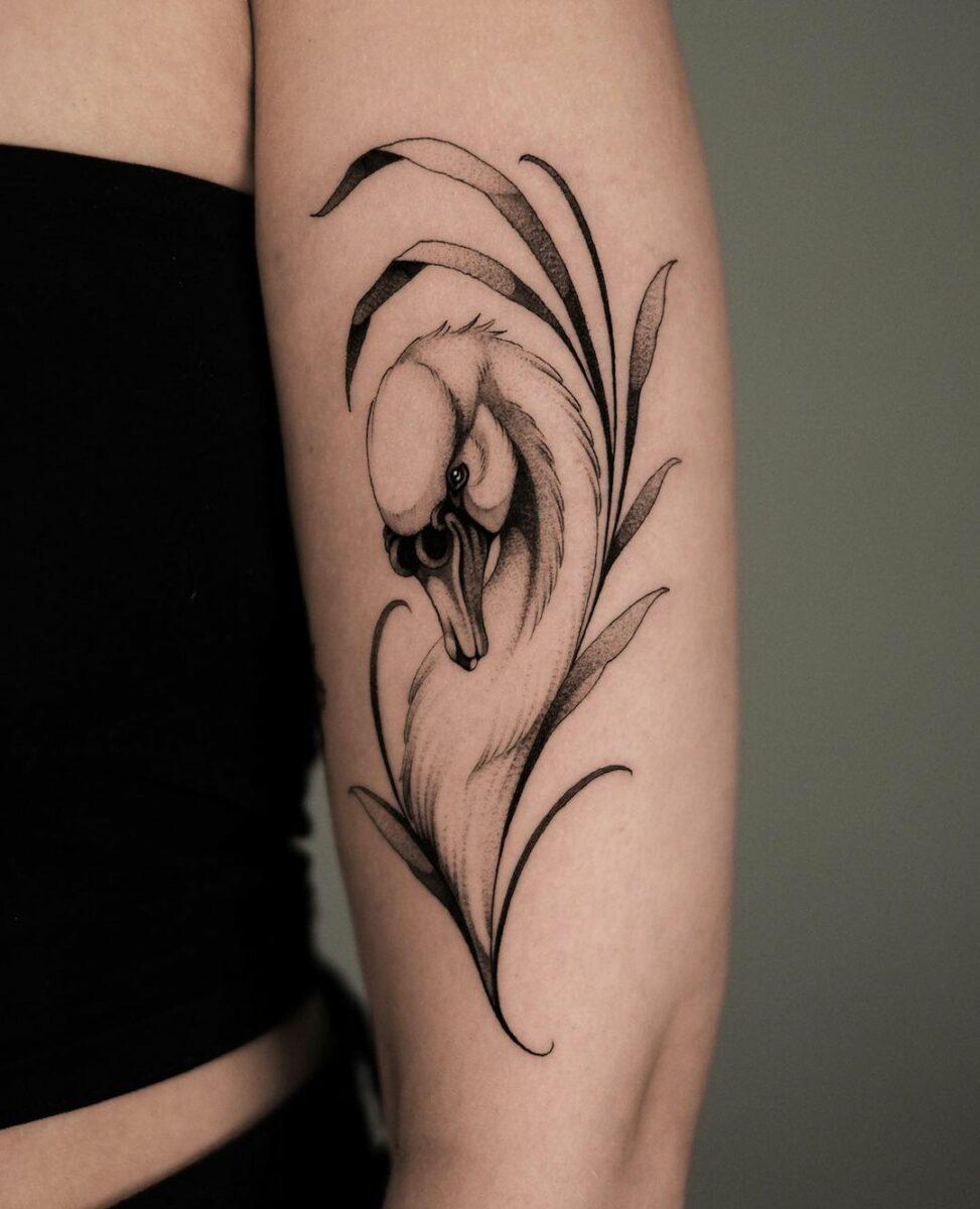 20 Captivating Swan Tattoos For A Graceful Appearance