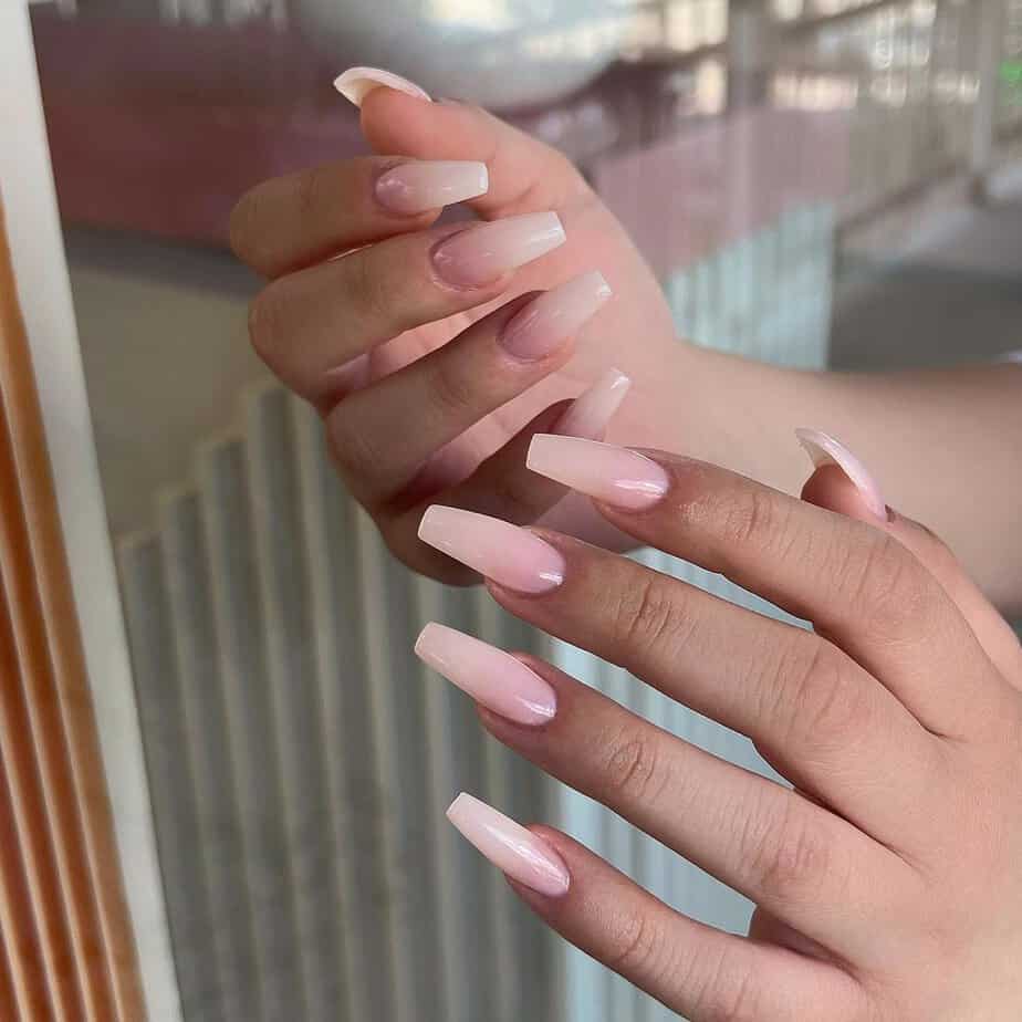 8. Long and luxurious nude nail designs