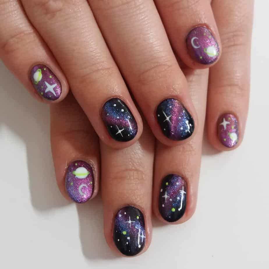 8. Pink and purple galaxy nails