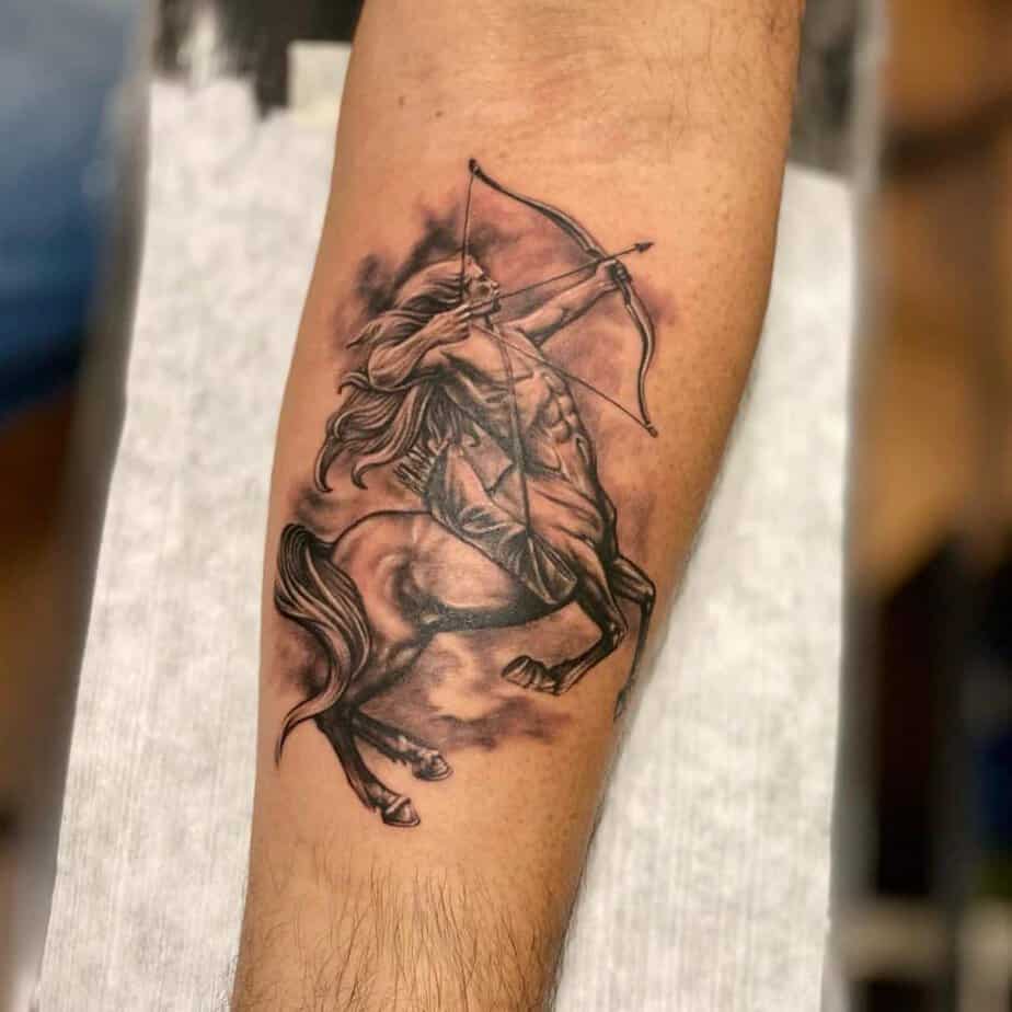 17. A Sagittarius archer tattoo on the forearm
