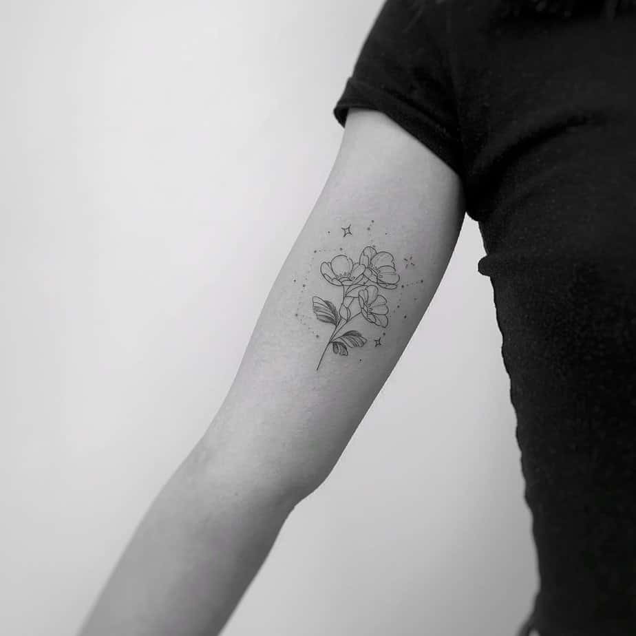 8. A Sagittarius constellation tattoo on the bicep
