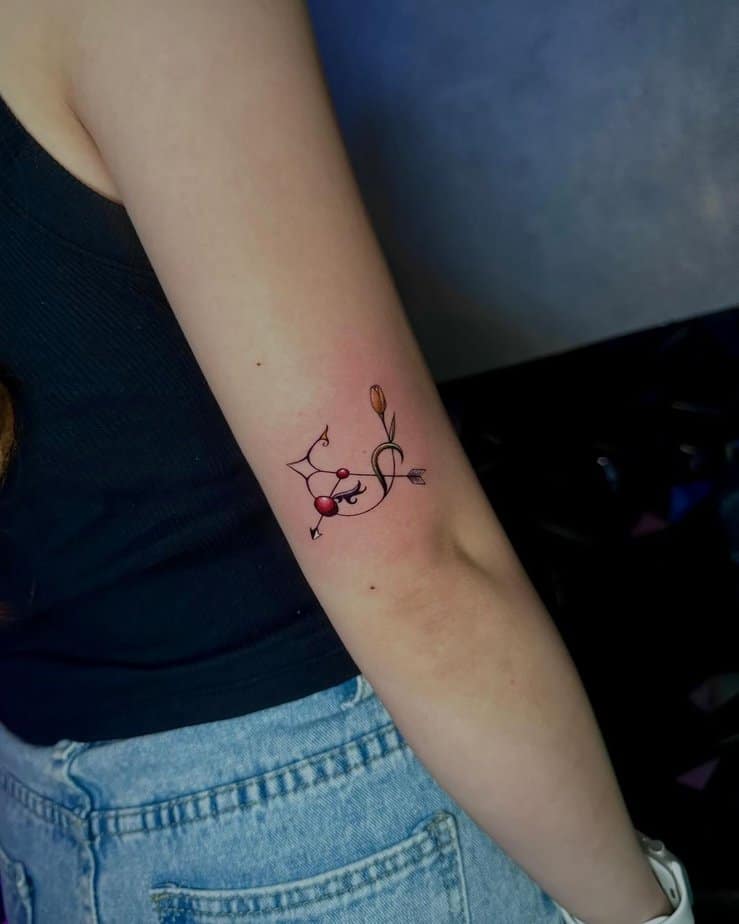22. A Sagittarius tattoo on the back of the arm

