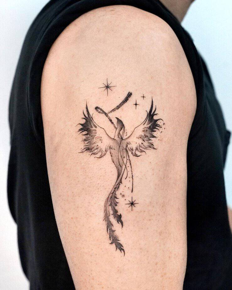 2. A Sagittarius tattoo with a Phoenix bird
