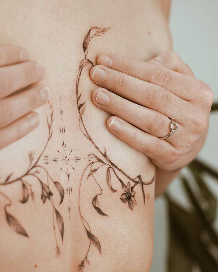 A botanical middle chest tattoo