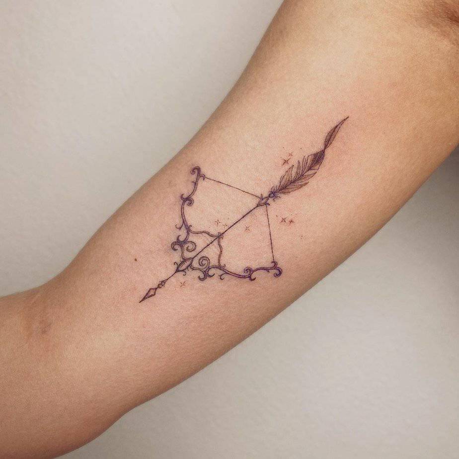 3. A bow and arrow Sagittarius tattoo
