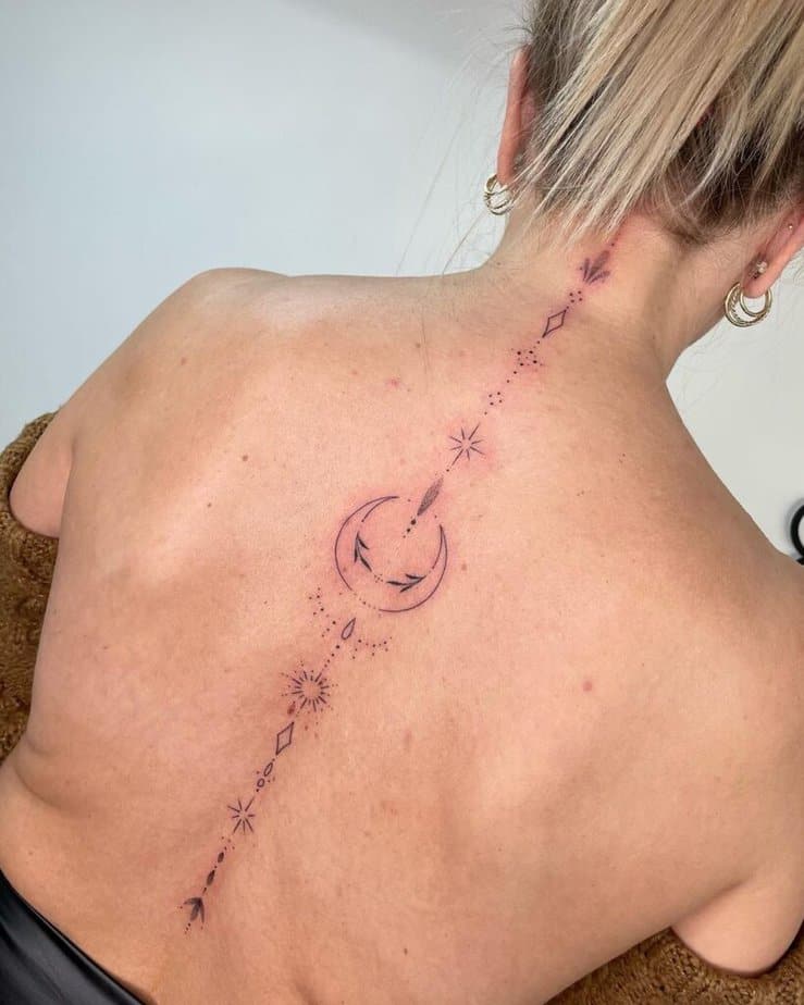 A celestial spine tattoo