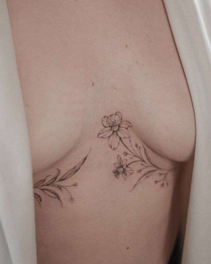 A daffodil middle chest tattoo