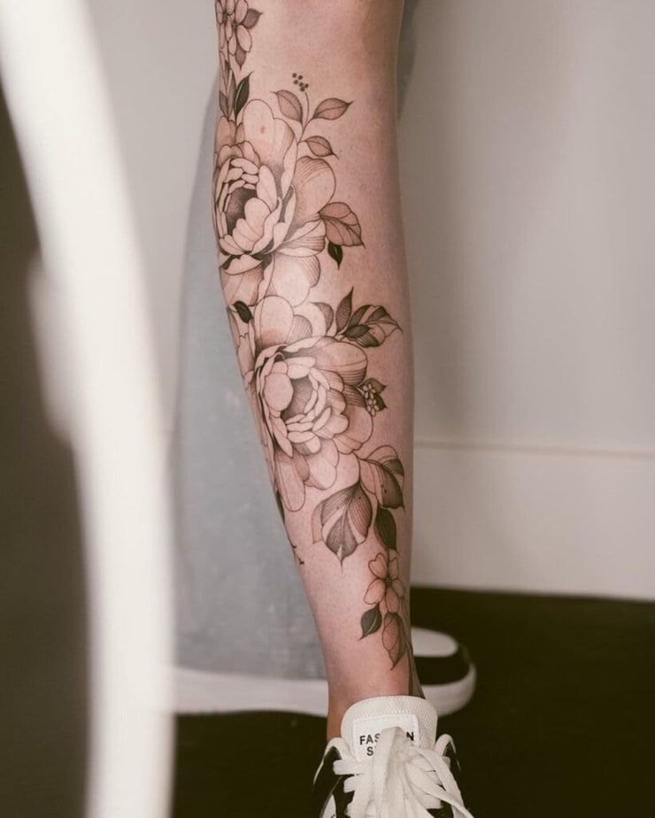 A floral shin tattoo