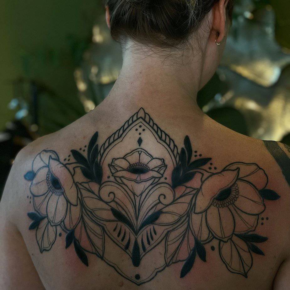11. A floral trap tattoo
