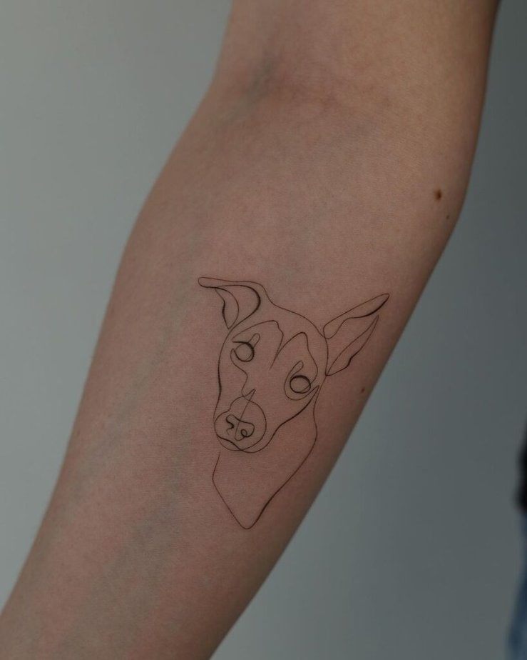 Un tatuaggio line-art del vostro amico a quattro zampe
